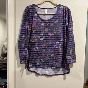 LuLaRoe multi colored top. Size medium. Excellent condition.